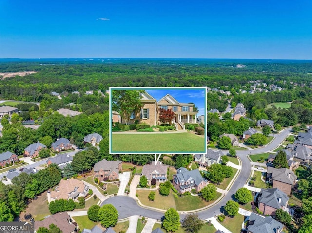 3456 Glen Mist Pl, Dacula, GA 30019 - aerial perspective of suburban area featuring a forest and property parcel outlined