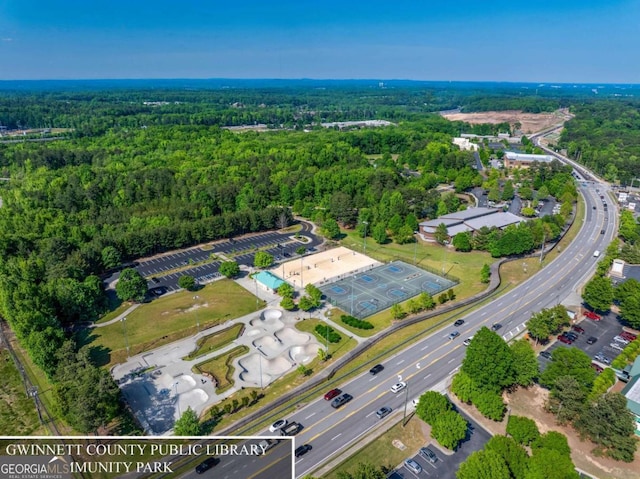 3456 Glen Mist Pl, Dacula, GA 30019 - view of property location featuring a heavily wooded area and a major roadway