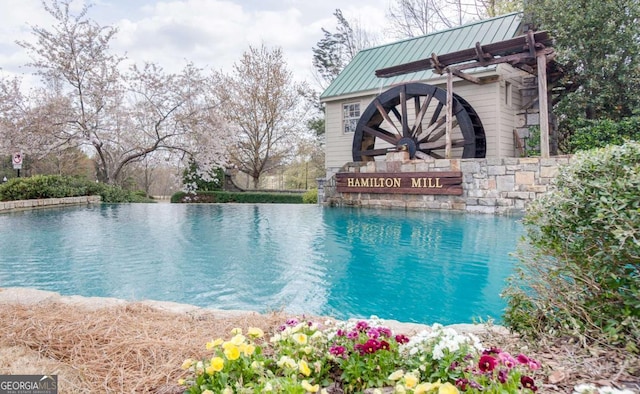 3456 Glen Mist Pl, Dacula, GA 30019 - view of swimming pool with a ceiling fan and an infinity pool