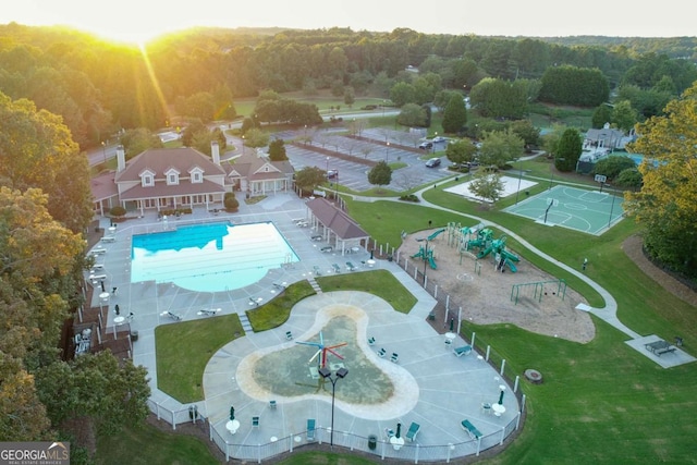 3456 Glen Mist Pl, Dacula, GA 30019 - aerial view of a pool area and a heavily wooded area