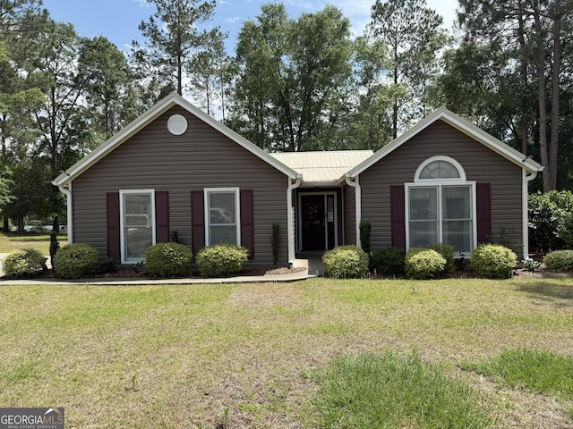 ranch-style home with a front yard
