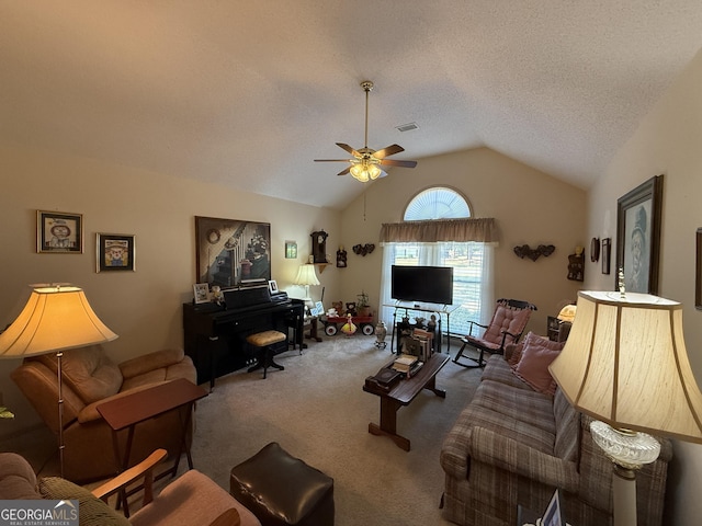 carpeted living area with ceiling fan, vaulted ceiling, and a textured ceiling