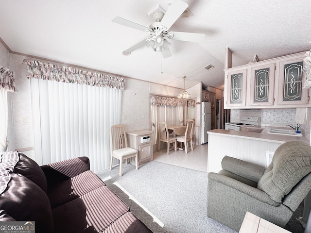 68 Nomad Trl, Cleveland, GA 30528 - living room featuring a ceiling fan, lofted ceiling, ornamental molding, and a chandelier