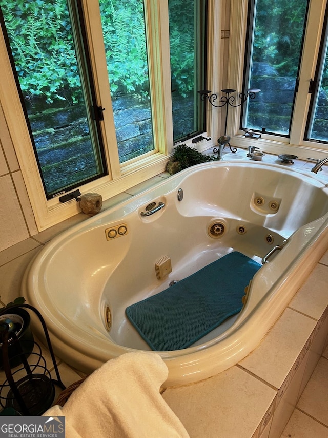 105 Chinquapin Ln, Clarkesville, GA 30523 - bathroom with a jetted tub and tile patterned floors