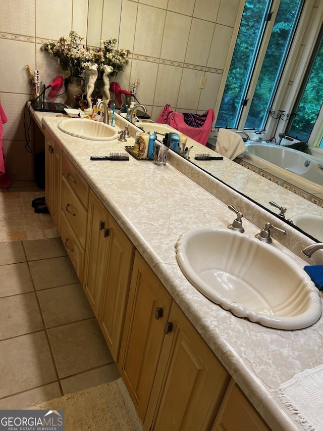 105 Chinquapin Ln, Clarkesville, GA 30523 - full bathroom featuring double vanity, a garden tub, tile patterned floors, and tile walls