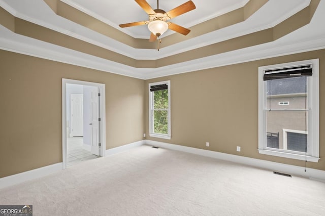 4842 Registry Dr NW, Kennesaw, GA 30152 - carpeted empty room with crown molding, a tray ceiling, baseboards, and ceiling fan