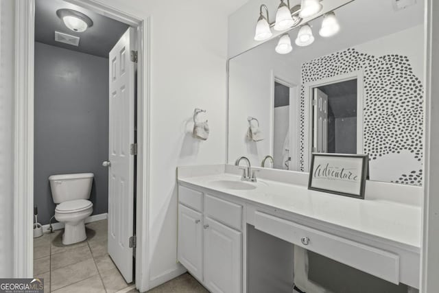4842 Registry Dr NW, Kennesaw, GA 30152 - bathroom featuring toilet, vanity, and tile patterned flooring