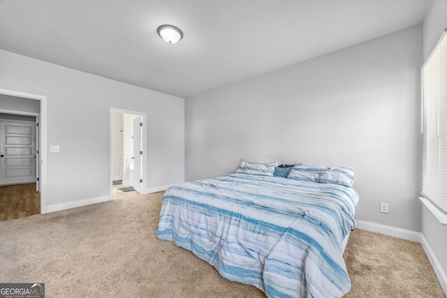 145 Gavin Way, Rincon, GA 31326 - bedroom with carpet, baseboards, and multiple windows