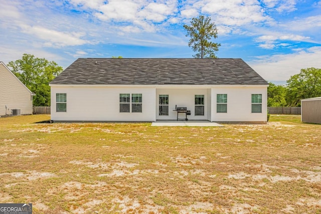 145 Gavin Way, Rincon, GA 31326 - rear view of property with a patio and central AC