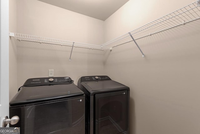 laundry area with washer and dryer