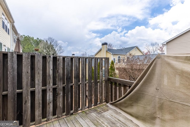 view of wooden balcony with a wooden deck
