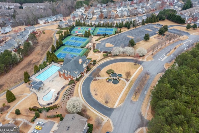 view of property location with a pool