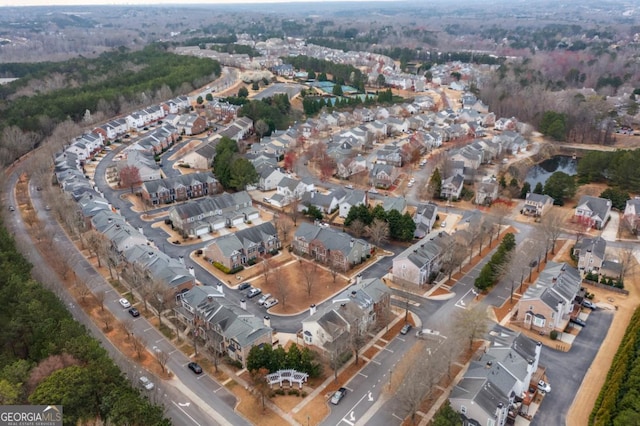 aerial view of property's location with nearby suburban area