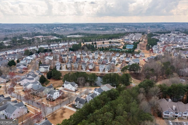 aerial overview of property's location featuring nearby suburban area