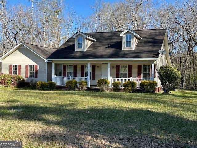 2506 Wateringhole Ct, Statesboro, GA 30458 - cape cod house featuring covered porch and a front lawn