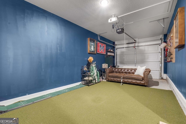 garage with a garage door opener and baseboards