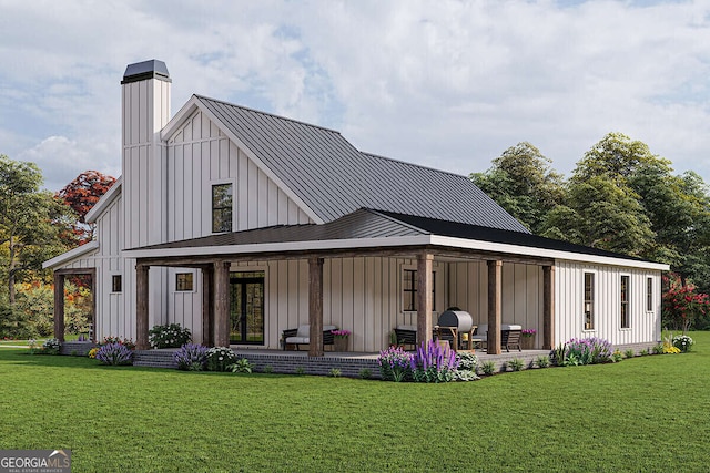 6586 Kenimer Rd, Clermont, GA 30527 - rear view of house featuring board and batten siding, a lawn, a chimney, and a patio