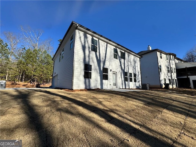 3964 Riverchess Dr SW, Atlanta, GA 30331 - rear view of house with central air condition unit