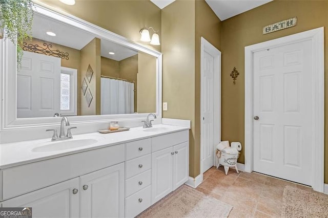 930 Brenau Point Dr, Gainesville, GA 30501 - full bath featuring double vanity and baseboards