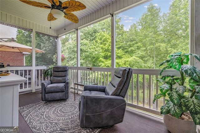 930 Brenau Point Dr, Gainesville, GA 30501 - deck featuring ceiling fan and a wooded view