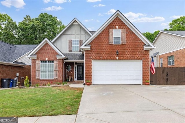 930 Brenau Point Dr, Gainesville, GA 30501 - traditional home with board and batten siding, brick siding, driveway, and a garage