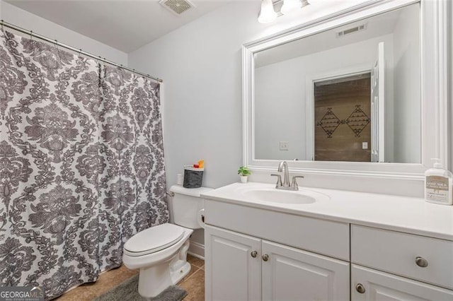 930 Brenau Point Dr, Gainesville, GA 30501 - full bath with vanity, tile patterned floors, and toilet