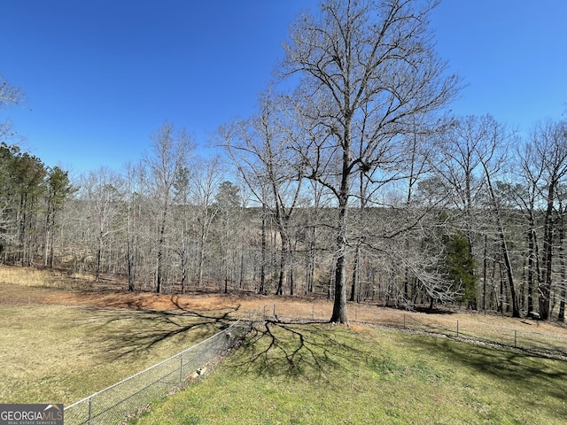 637 Lakeview Dr, Newborn, GA 30056 - view of yard featuring a forest view
