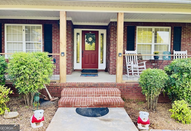 637 Lakeview Dr, Newborn, GA 30056 - doorway to property with a porch and brick siding