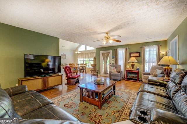 637 Lakeview Dr, Newborn, GA 30056 - living room with ceiling fan, a textured ceiling, and wood finished floors