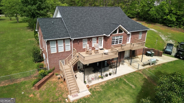637 Lakeview Dr, Newborn, GA 30056 - rear view of house with a wooden deck, a patio, and brick siding