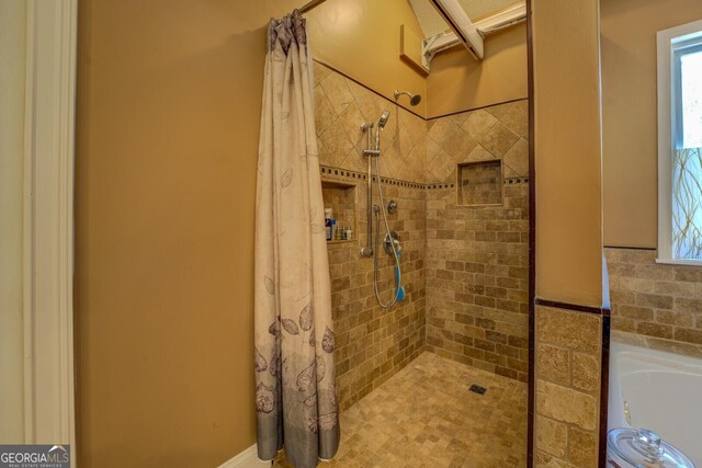 637 Lakeview Dr, Newborn, GA 30056 - bathroom featuring a tile shower and a bath