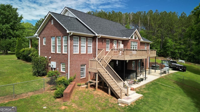 637 Lakeview Dr, Newborn, GA 30056 - rear view of property featuring brick siding, a wooden deck, a jacuzzi, stairs, and a patio
