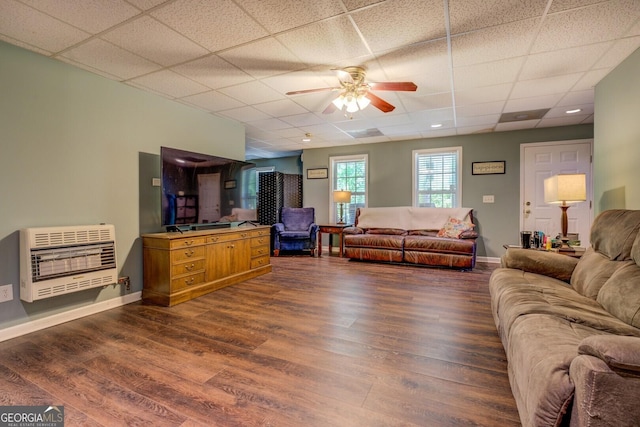 637 Lakeview Dr, Newborn, GA 30056 - living room featuring heating unit, a ceiling fan, dark wood-style flooring, a paneled ceiling, and baseboards
