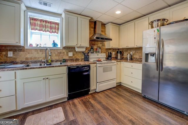 637 Lakeview Dr, Newborn, GA 30056 - kitchen featuring stainless steel refrigerator with ice dispenser, wall chimney exhaust hood, dishwasher, white electric range, and a sink