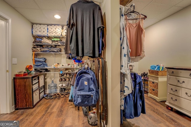 637 Lakeview Dr, Newborn, GA 30056 - spacious closet featuring a drop ceiling and wood finished floors