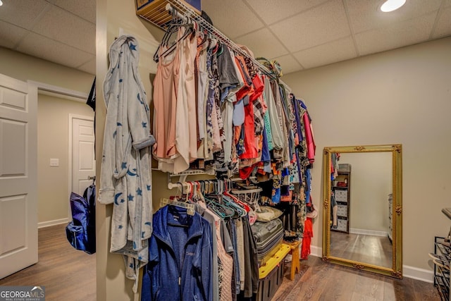 637 Lakeview Dr, Newborn, GA 30056 - spacious closet with a paneled ceiling and wood finished floors
