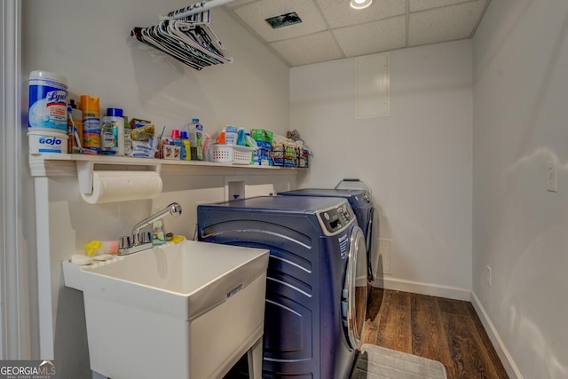 637 Lakeview Dr, Newborn, GA 30056 - washroom with wood finished floors, washer and clothes dryer, and baseboards