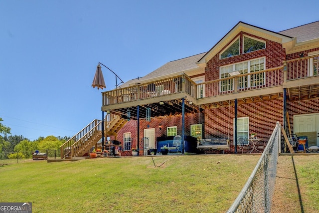 637 Lakeview Dr, Newborn, GA 30056 - rear view of property with stairs, brick siding, and a deck