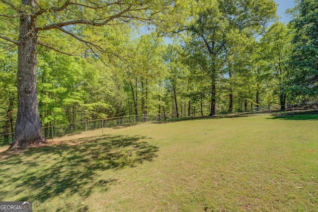 637 Lakeview Dr, Newborn, GA 30056 - view of yard featuring a forest view