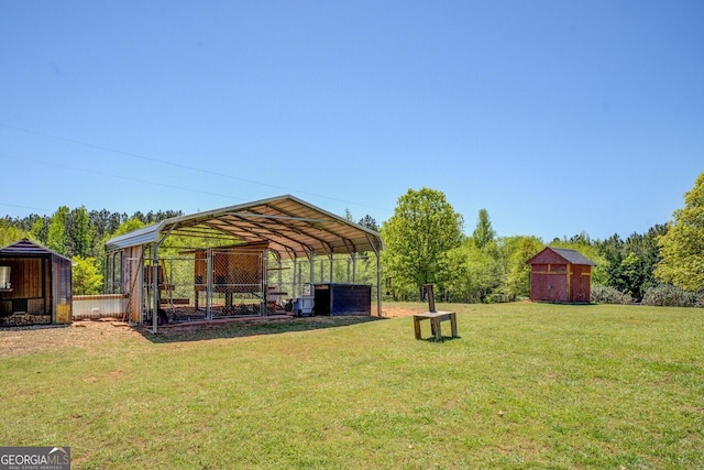 637 Lakeview Dr, Newborn, GA 30056 - view of green lawn featuring a carport and an outdoor structure
