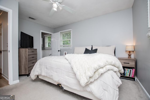 4529 Lakeview Dr, Powder Springs, GA 30127 - bedroom featuring light carpet and ceiling fan