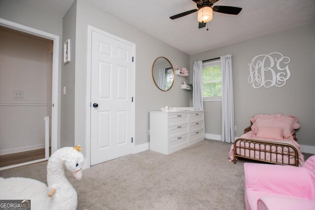4529 Lakeview Dr, Powder Springs, GA 30127 - carpeted bedroom with a ceiling fan and baseboards