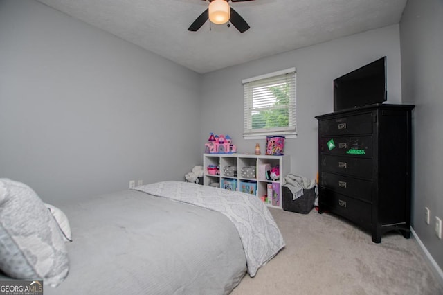 4529 Lakeview Dr, Powder Springs, GA 30127 - carpeted bedroom featuring a ceiling fan