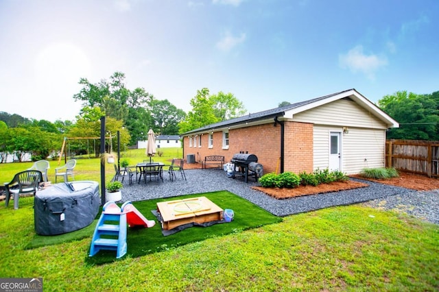 4529 Lakeview Dr, Powder Springs, GA 30127 - back of property with brick siding and a patio area