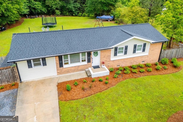 4529 Lakeview Dr, Powder Springs, GA 30127 - ranch-style home featuring brick siding, crawl space, roof with shingles, and a trampoline