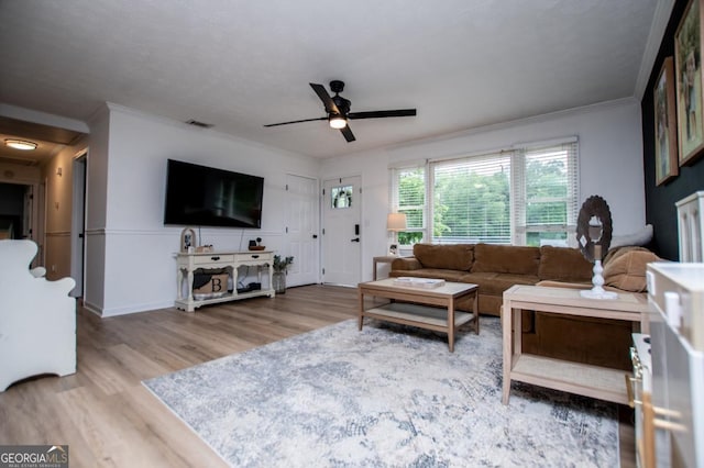 4529 Lakeview Dr, Powder Springs, GA 30127 - living area featuring wood finished floors, ceiling fan, and ornamental molding