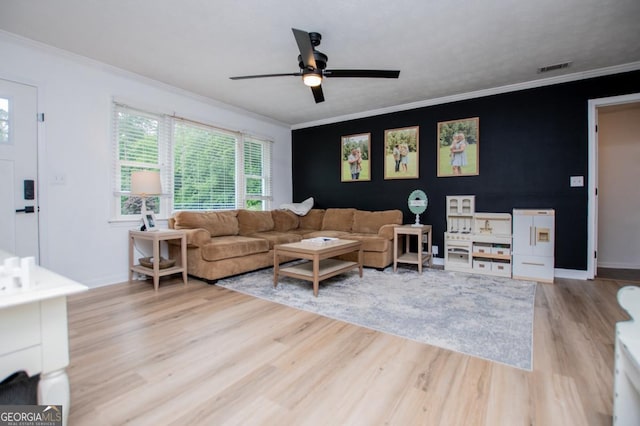 4529 Lakeview Dr, Powder Springs, GA 30127 - living room featuring light wood-type flooring, ceiling fan, and ornamental molding