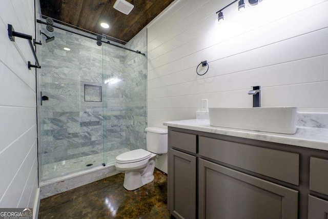 bathroom featuring a stall shower, toilet, vanity, and wooden ceiling