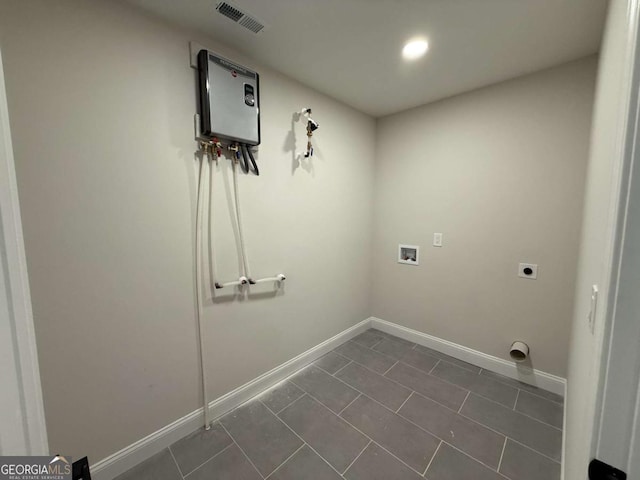 6205 Hudson St NW, Covington, GA 30014 - bathroom with toilet, tile patterned flooring, vanity, recessed lighting, and shower / washtub combination