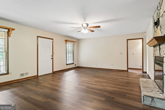 368 Henry Higgins Rd, Jackson, GA 30233 - unfurnished living room featuring ceiling fan, healthy amount of natural light, and wood finished floors